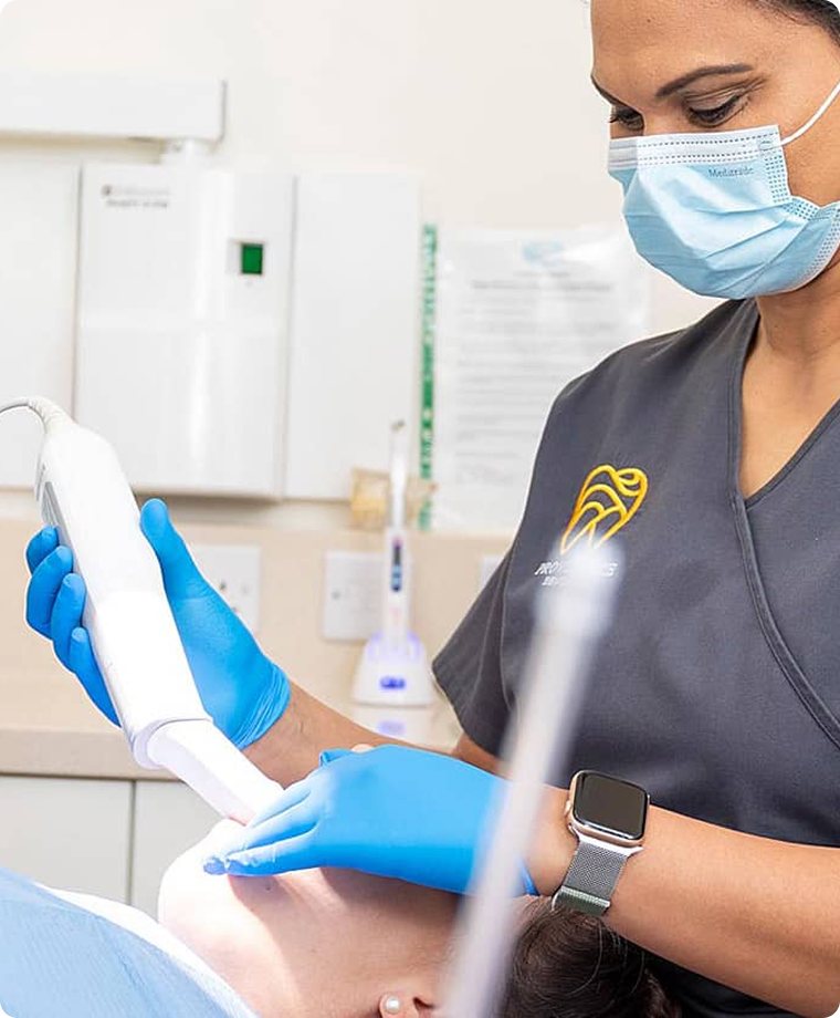 A Providence Dental clinician treating a patient