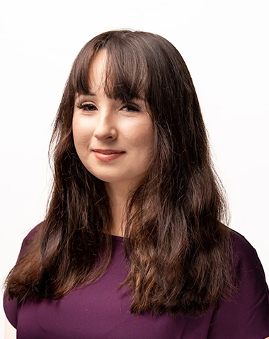 Elysia, welcoming receptionist at Providence Dental offering professional and caring front desk support